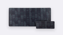 Load image into Gallery viewer, Cats Deskpad in Bombay, a dark charcoal pattern of cartoon cat faces, shown in 900x400 and 160x400 sizes
