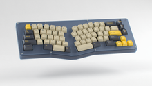 Load image into Gallery viewer, Render of DCS Mudbeam keycaps on a navy Kolibri ergo keyboard