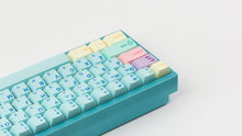 Load image into Gallery viewer, Cherry Flowershop on a blue keyboard back view left side