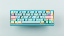 Load image into Gallery viewer, Cherry Flowershop on a blue keyboard