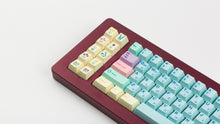 Load image into Gallery viewer, Cherry Flowershop on a maroon nk+ zoomed in on left