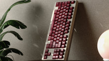Load image into Gallery viewer, render of GMK CYL Blot R2 leaned against a wall on a silver keyboard