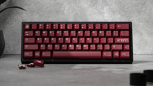 Load image into Gallery viewer, render of GMK CYL Blot R2 in front of a concrete wall