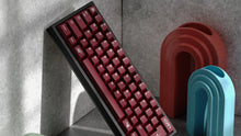 Load image into Gallery viewer, render of GMK CYL Blot R2 leaned against a wall