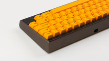 Load image into Gallery viewer, GMK CYL ADA keycaps on dark 60% keyboard, rear angle showing case profile
