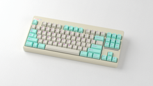 Load image into Gallery viewer, render of GMK CYL Analog Dreams R3 keycaps on a Classic TKL keyboard, angled full view with Latin legends and mint modifiers
