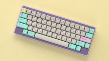 Load image into Gallery viewer, render of GMK CYL Analog Dreams R3 keycaps on a KC Zero 60% keyboard, angled view with hiragana legends over a yellow background