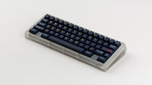 Load image into Gallery viewer, GMK CYL Awaken on a clear keyboard angled
