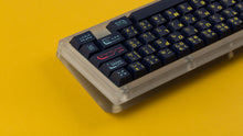 Load image into Gallery viewer, GMK CYL Awaken on a clear keyboard zoomed in on right back