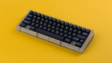 Load image into Gallery viewer, GMK CYL Awaken on a clear keyboard angled