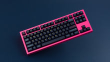 Load image into Gallery viewer, GMK CYL Awaken on a pink NK87 keyboard angled