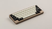 Load image into Gallery viewer, GMK CYL Black Snail on a beige keyboard