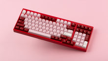 Load image into Gallery viewer, GMK CYL Darling on a red keyboard