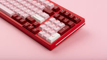 Load image into Gallery viewer, GMK CYL Darling on a red keyboard close up on right side