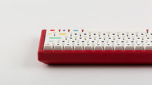 Load image into Gallery viewer, GMK CYL Dots light base on a red keyboard zoomed in on right back