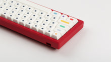 Load image into Gallery viewer, GMK CYL Dots light base on a red keyboard zoomed in on left back