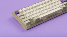 Load image into Gallery viewer, GMK CYL Hyperbeige on a frosted keyboard close up on left side