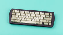 Load image into Gallery viewer, GMK CYL Hyperbeige on a CAT 65 keyboard angled