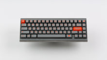 Load image into Gallery viewer, GMK CYL Kaiju Part Deux on silver keyboard