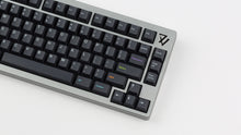 Load image into Gallery viewer, Monokai Material V2 on a grey 7V close up right side