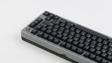 Load image into Gallery viewer, Monokai Material V2 on a grey 7V back angle