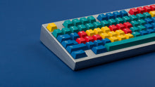Load image into Gallery viewer, GMK CYL Panels on a silver keyboard zoomed in on left