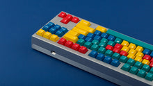 Load image into Gallery viewer, GMK CYL Panels on a silver keyboard back view right side