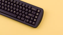 Load image into Gallery viewer, GMK CYL Phantom R2 on a purple cat65 keyboard close up on right