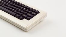 Load image into Gallery viewer, GMK CYL Phantom R2 on a beige keyboard close up on right