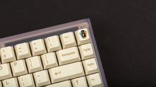 Load image into Gallery viewer, GMK CYL Rainbow 6 Siege - Winner's Circle on a Clear PC keyboard close up of top right