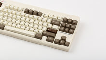 Load image into Gallery viewer, GMK CYL Sloth on a beige CLASSIC-TKL angled close up on right side