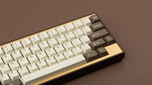 Load image into Gallery viewer, GMK CYL Sloth on a Dark Gold and Gold Keycult ZERO close up on right side