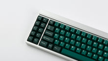 Load image into Gallery viewer, GMK CYL Taiga R2 keycaps on silver aluminum 1800-layout keyboard, close-up of left side with macro keys