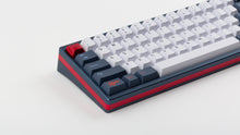 Load image into Gallery viewer, GMK CYL Trackday on a blue keyboard angled left
