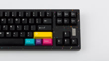 Load image into Gallery viewer, GMK CYL WoB Addon on black keyboard zoomed in on right