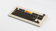 Load image into Gallery viewer, GMK MTNU 800 on a beige keyboard angled