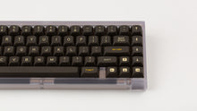 Load image into Gallery viewer, GMK MTNU 800 on a translucent keyboard close up on right side