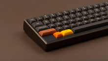 Load image into Gallery viewer, GMK MTNU 800 on a dark gold and lack Keycult Zero close up on left side