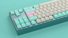 Load image into Gallery viewer, render of GMK CYL Analog Dreams MTNU keycaps, close-up on a Frog keyboard with a pink Enter key and mint accents