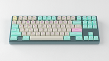 Load image into Gallery viewer, render of GMK CYL Analog Dreams MTNU keycaps on a Frog keyboard, front view with Latin and hiragana legends