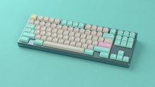 Load image into Gallery viewer, render of GMK CYL Analog Dreams MTNU keycaps on a Frog keyboard, angled view over a teal background