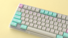 Load image into Gallery viewer, render of GMK CYL Analog Dreams MTNU keycaps, close-up on a Horizon TKL keyboard with hiragana legends and mint accents