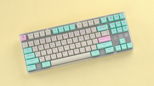 Load image into Gallery viewer, render of GMK CYL Analog Dreams MTNU keycaps on a Horizon TKL keyboard, angled full view with hiragana legends over a yellow background