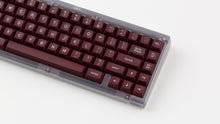 Load image into Gallery viewer, GMK MTNU Rascals on a transparent keyboard close up on right side