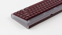 Load image into Gallery viewer, GMK MTNU Rascals on a transparent keyboard close up abck view on right side