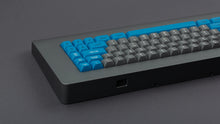 Load image into Gallery viewer, GMK MTNU Space Cadet on a grey keyboard back view of right side