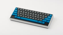 Load image into Gallery viewer, GMK MTNU Space Cadet on a silver Keycult Zero keyboard with black accent bars angled