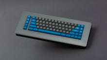 Load image into Gallery viewer, GMK MTNU Space Cadet on a grey keyboard