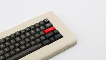 Load image into Gallery viewer, MTNU Susu on a beige keyboard zoomed in on right