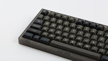 Load image into Gallery viewer, MTNU Susu on a Smoke NK87 zoomed in on left